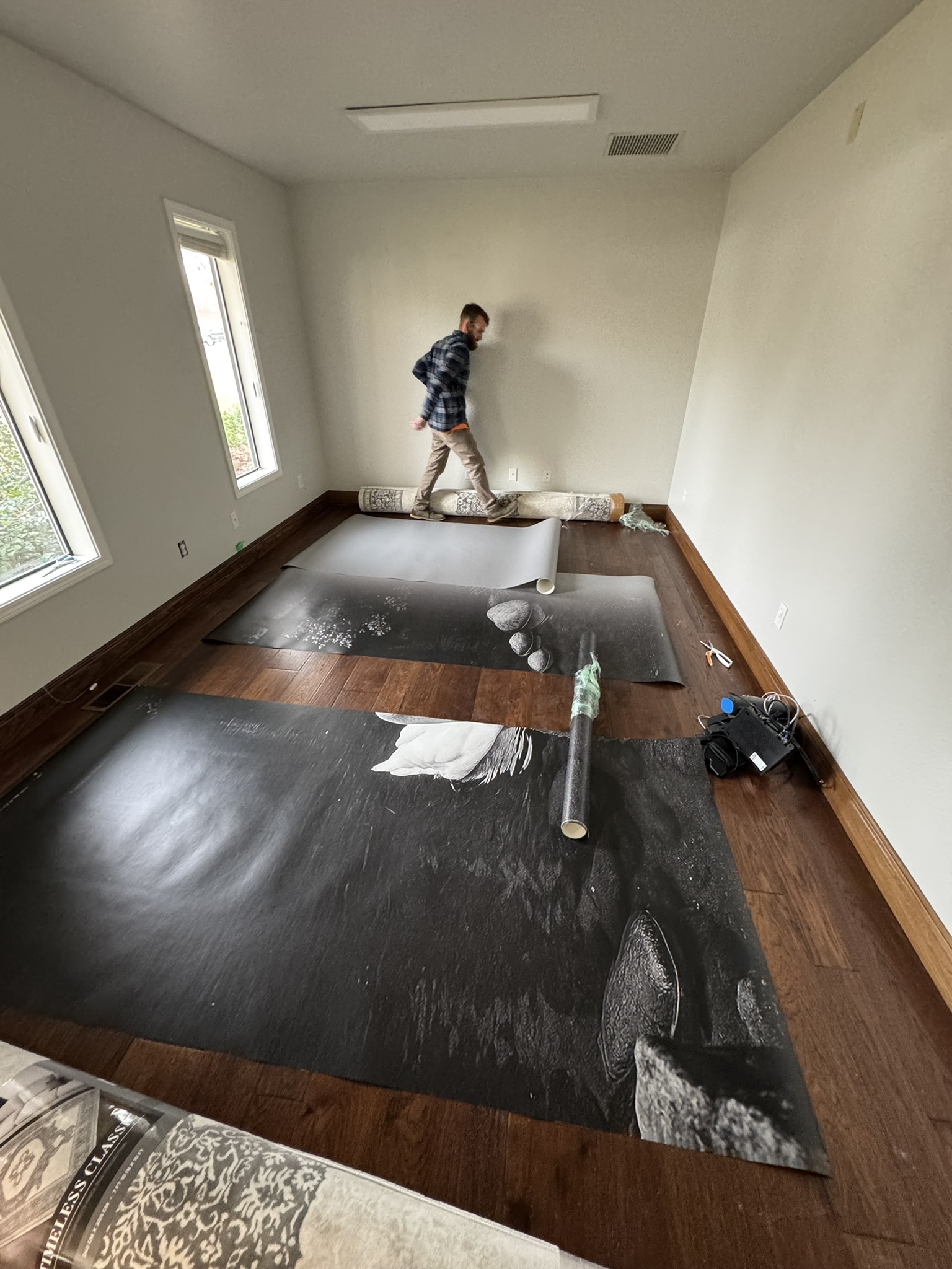 Wallpaper mural panels arranged on the floor before installation